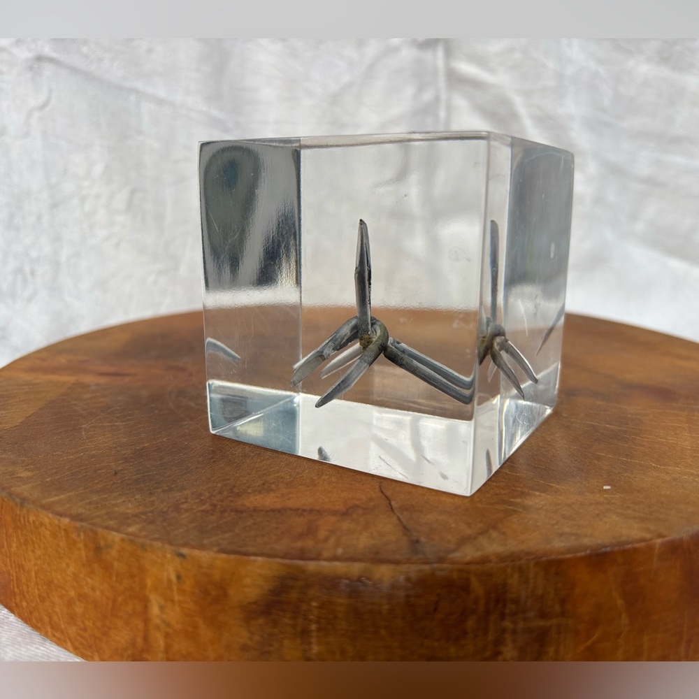Acrylic Cube Paperweight with Embedded Metal Sculpture - Clear
